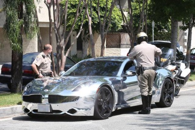 Justin Bieber ticketed by police in his Fisker Karma