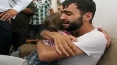Syrian-father-and-son-reunited after Chemical Weapons attacks-016